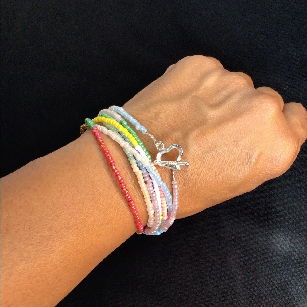 Multi-Colored Multi-Strand Glass Beaded Necklace, Bracelet, & Earring Set.